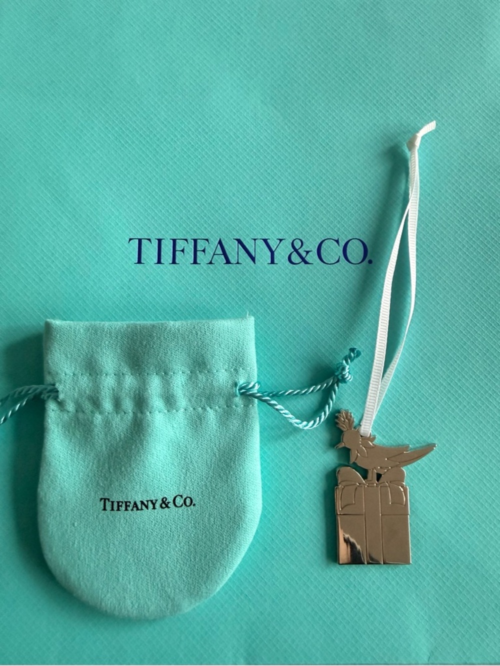 Tiffany & Co. Bird on Gift Silver-Tone Charm with gift bag